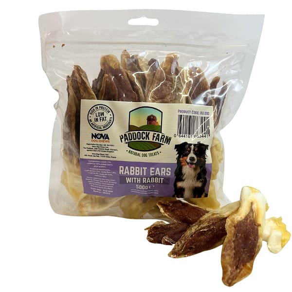 Paddock Farm Rabbit Ears with Rabbit 1080px Pack of Rabbit ears dog treats stuffed with rabbit meat, with some loose in front of the pack