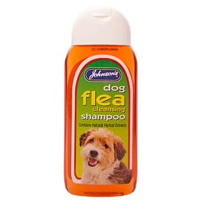 Bottle of dog flea shampoo with small dog on label