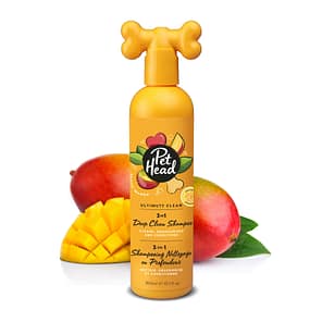 Pet Head Ultimutt Clean 3in1 Shampoo Orange bottle with Cut and whole mangoes behind