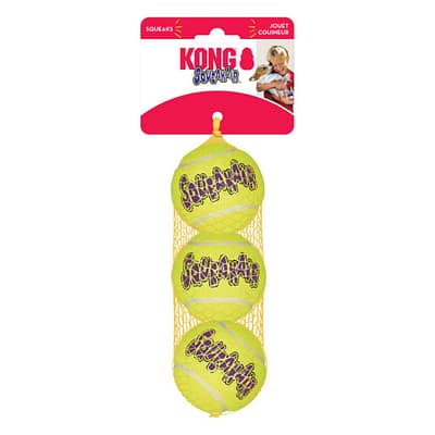 3 Dog Balls stacked vertically in a net with sale hanger card