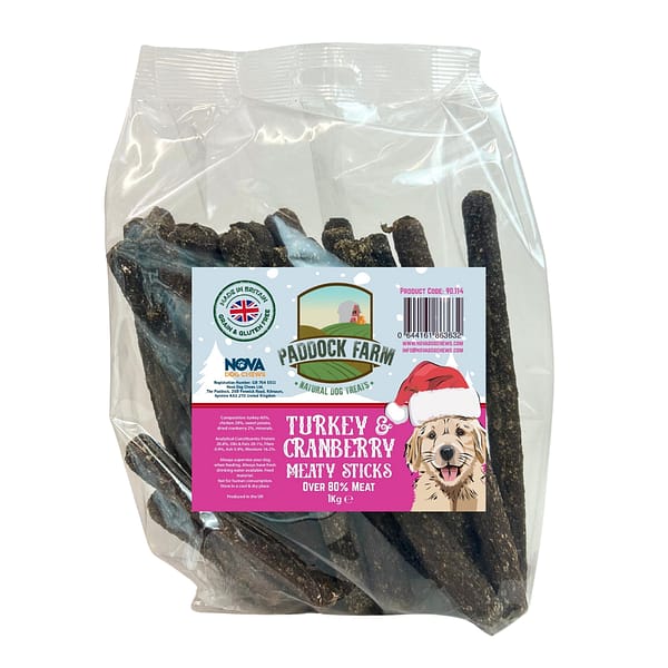 1kg pack of Turkey & Cranberry meaty stick/sausages dog treats featuring a smiling cartoon labrador on the front wearing a santa hat