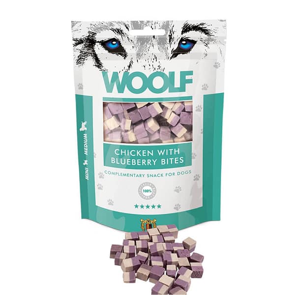 Woolf Chicken and Blueberry Bites open 1080 Woolf Dog Snacks in pack with some product loose in front of bag