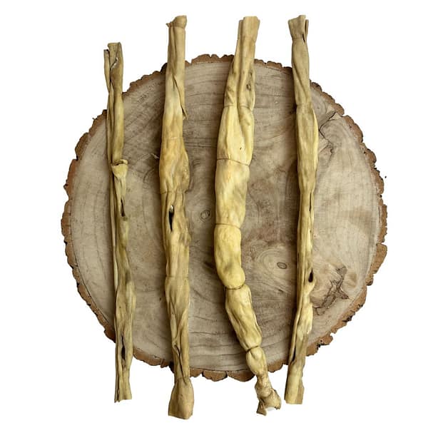 4 rolls of lamb skin on a display log